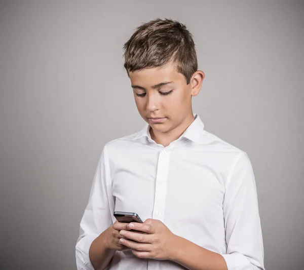 Teenager texting on smart phone