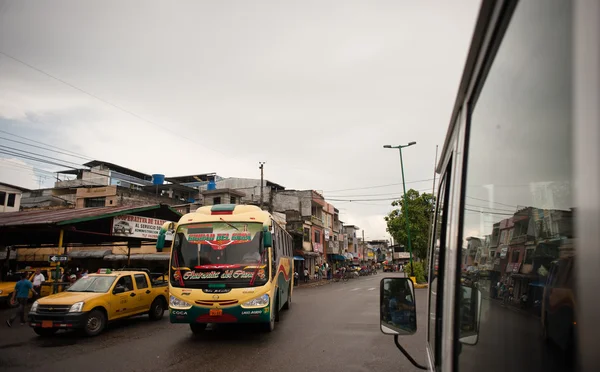 Street scene with bus in Coca, Ecuador