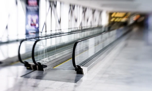 Tilt-shift view of horizontal escalator