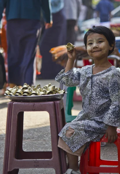 Young Bells seller in the street