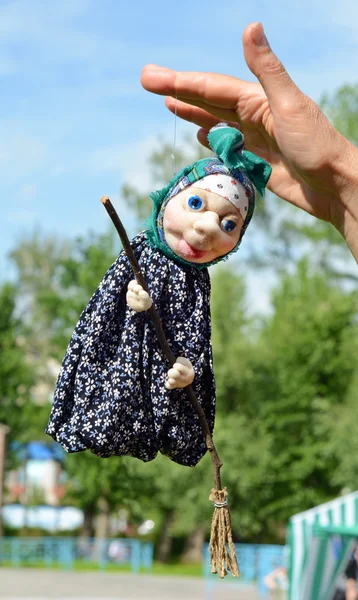 Doll Witch (Baba Yaga) with a broom