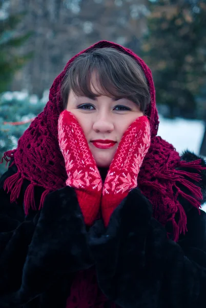 Woman in red gloves