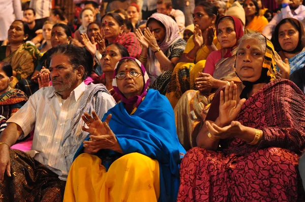 Unidentified Indian people at the ceremony puja in Varanasi, Ind
