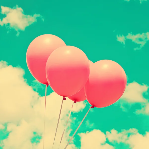 Pink Balloons on Retro Sky
