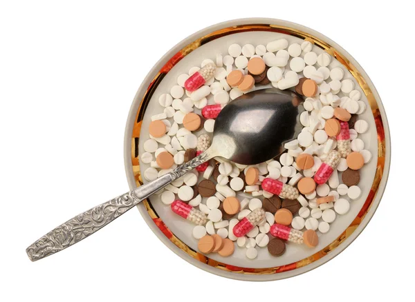 Pills on the saucer — Stock Photo, Image