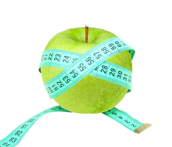 Fita métrica em maçã verde — Fotografia de Stock