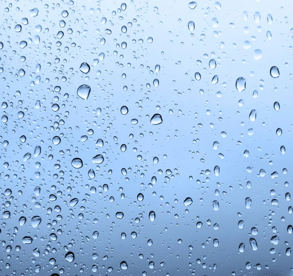 Gotas de agua en un vaso — Foto de Stock