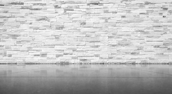 Brick wall with tiled floor — Stock Photo, Image