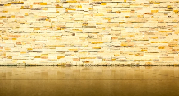Brick wall with tiled floor — Stock Photo, Image