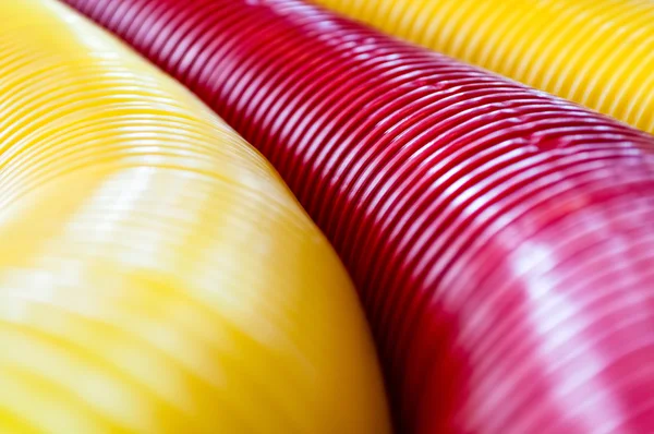 Abstract red and yellow background from tubes. — Stock Photo, Image