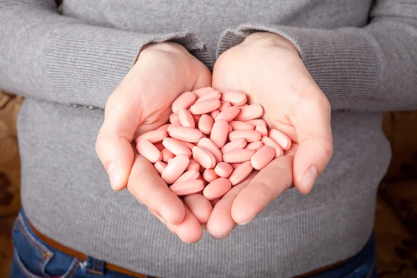 Many pills in the hands — Stock Photo, Image
