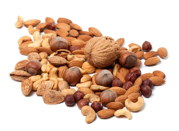 Assortment of raw and roasted nuts – stockfoto