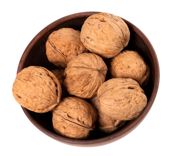 Walnuts in ceramic bowl. Top view. — Stock Photo, Image