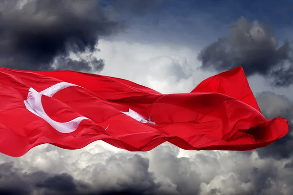 Waving flag of Turkey against storm clouds — Stock Photo, Image