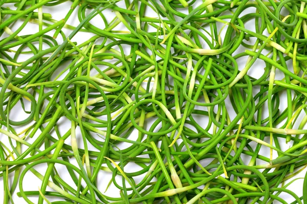 Background of fresh garlic scape — Stock Photo, Image