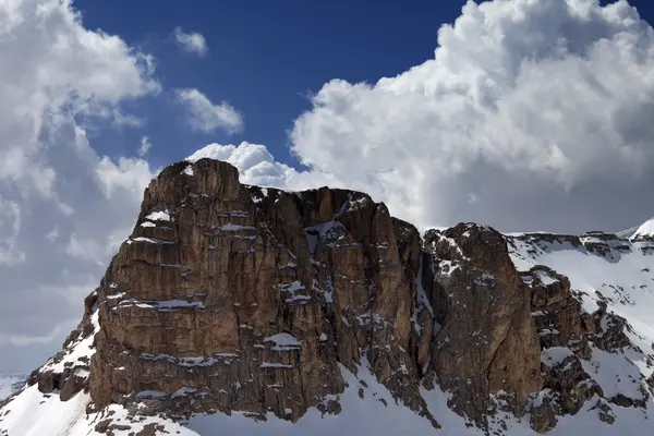 Rocks and blue sky with clouds — Stock Photo, Image