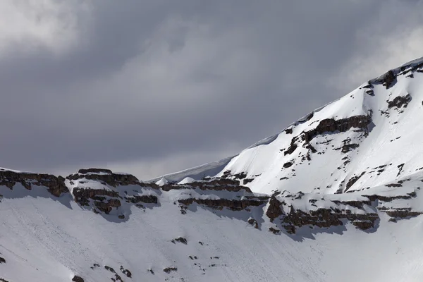 Top of mountains with snow cornice — Stock Photo, Image