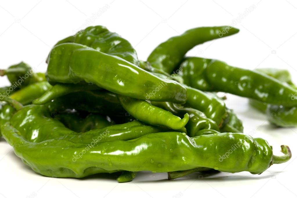 Green peppers with water drops