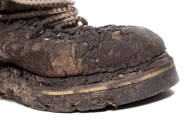 Old dirty hiking boot isolated on white background — Stock Photo, Image