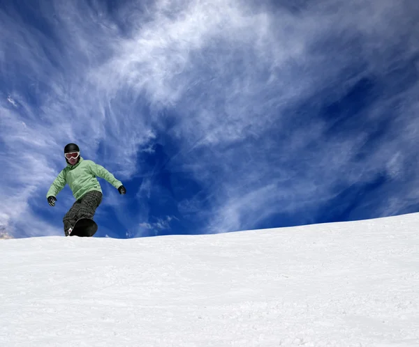 Snowboarder on off-piste slope — Stock Photo, Image