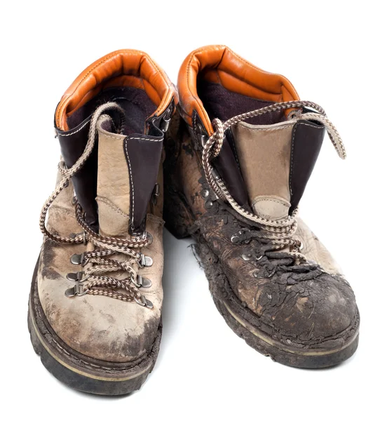 Pair of old dirty trekking boots — Stock Photo, Image