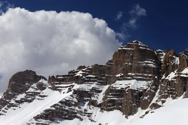 Rocks and blue sky with clouds — Stock Photo, Image