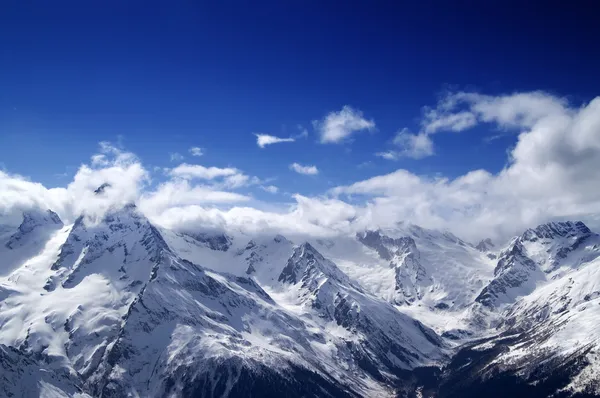 Snowy mountains at sun day Royalty Free Stock Images