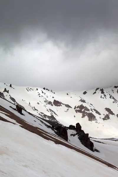 Snowy mountains in bad weather — Stock Photo, Image