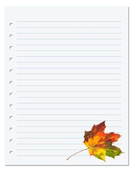 Notebook paper with multicolor autumn maple leaf on white — Stock Photo, Image