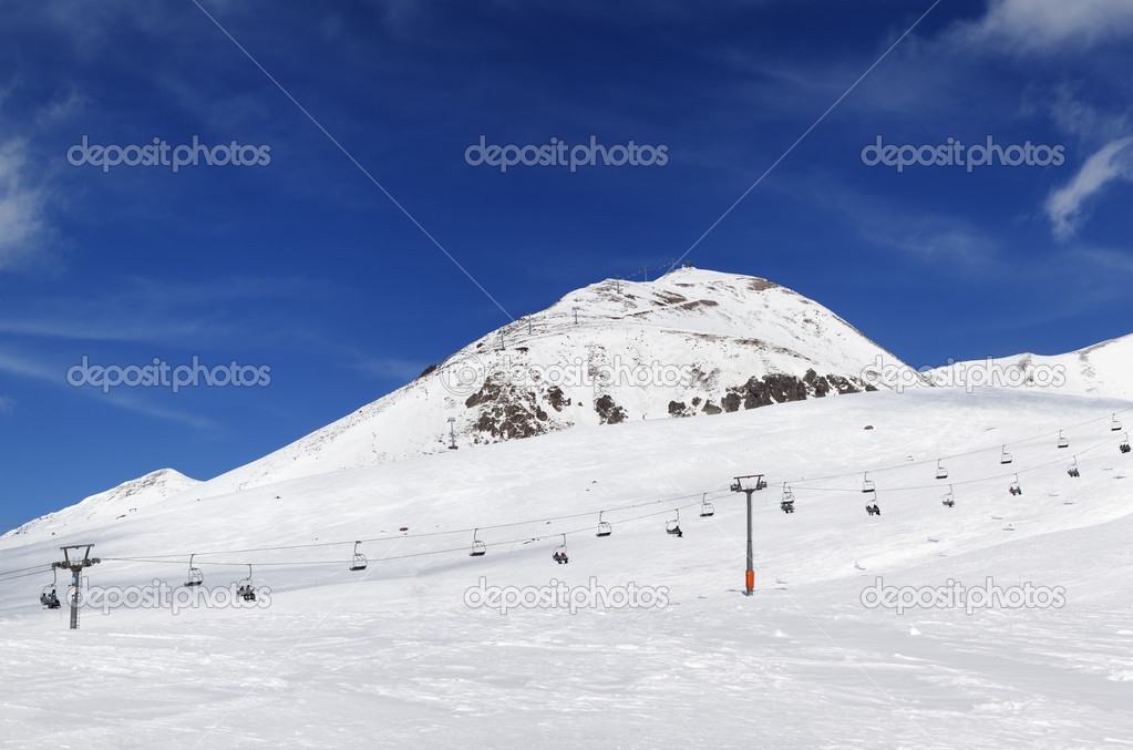 Panorama of ski resort at sunny winter day
