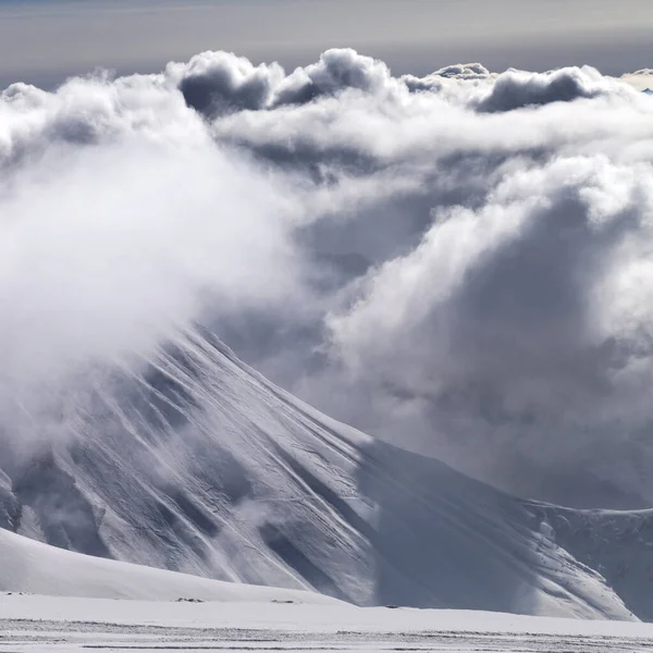 Ski Slope Snowy Mountains Sunlight Storm Clouds Snowfall Winter Evening — Stock Photo, Image