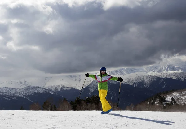 Happy Young Skier Ski Poles Sun Mountains Cloudy Gray Sky — 图库照片