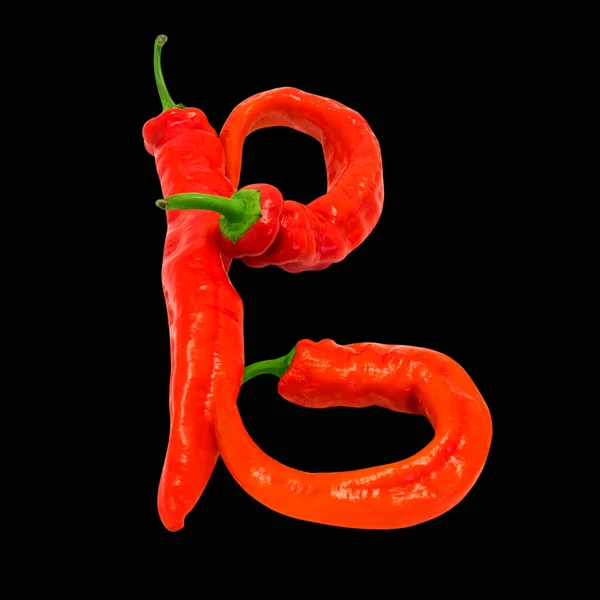 字母B由成熟的红辣椒组成 被隔离在黑色背景下 — 图库照片