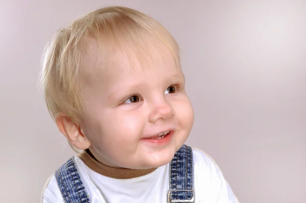 Menino da criança sorrindo — Fotografia de Stock