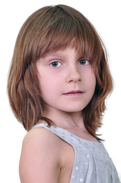 Elementary age girl looking at camera — Stock Photo, Image