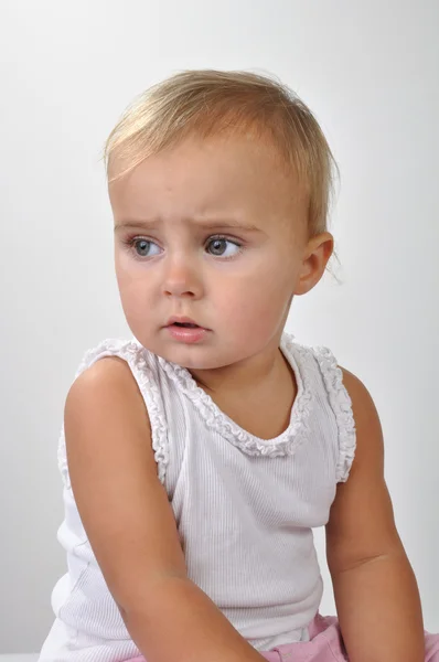 Pretty toddler girl looking aside — Stock Photo, Image