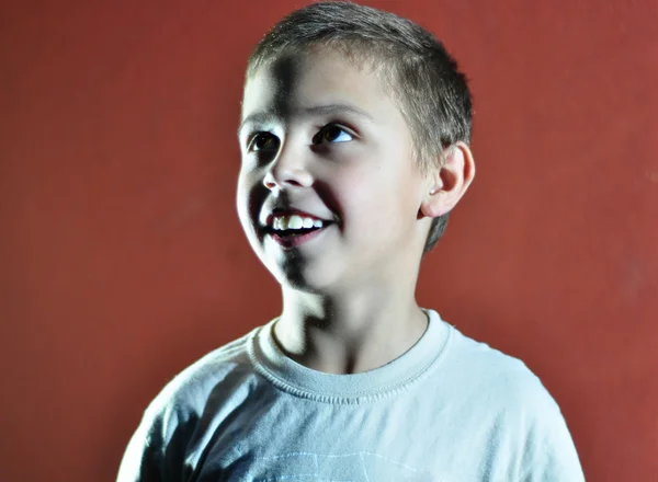 Excited face of a small boy — Stock Photo, Image