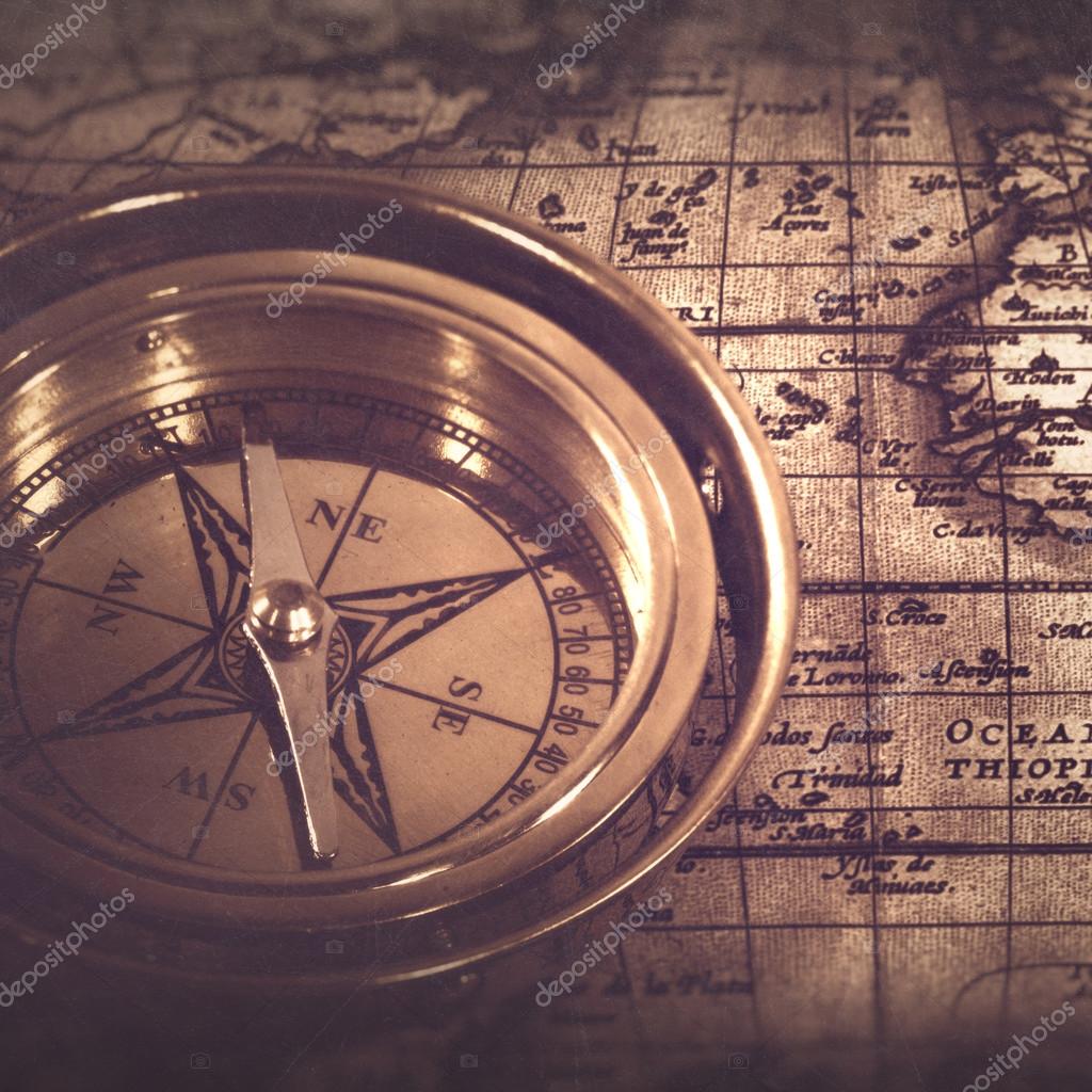 Old nautical compass over the map — Stock Photo © tolokonov 40209665