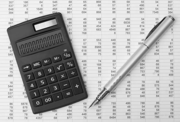 Calculatrice et stylo — Photo