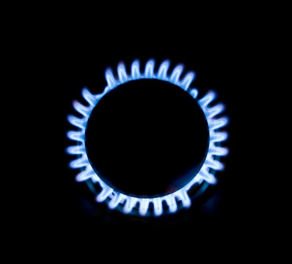 Голубой газ в темноте — стоковое фото