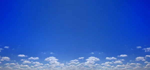 White clouds over blue sky — Stock Photo, Image