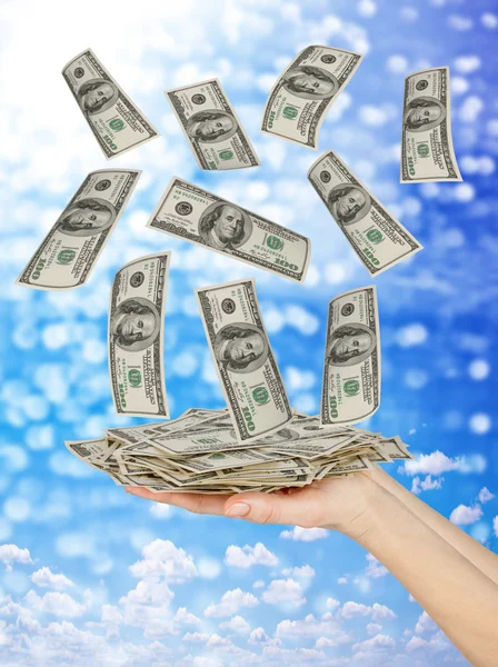 Hand holds dollars — Stock Photo, Image