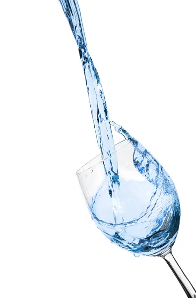 Water pouring into glass on white background — Stock Photo, Image