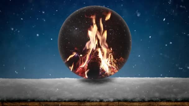 Auf Der Schneekugel Der Das Feuer Brennt — Stockvideo