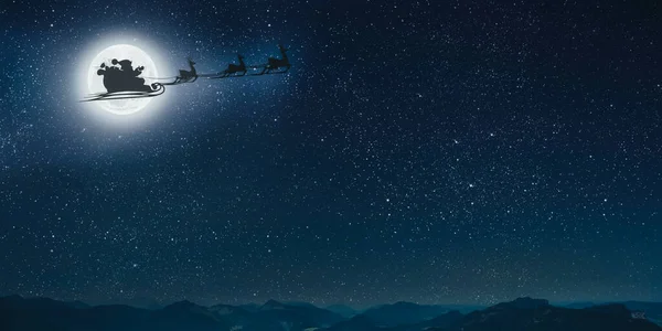 Silhouette Eines Fliegenden Weihnachtsmannes Vor Dem Hintergrund Des Weihnachtsnachthimmels — Stockfoto