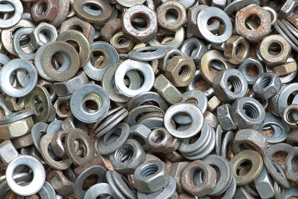 Nuts and washers in a drawer Stock Image