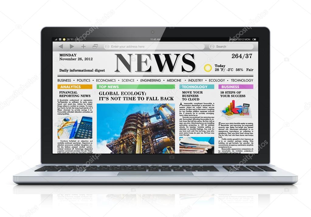 Laptop with business news site on screen