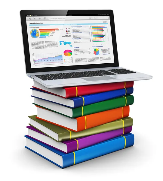Ноутбук на стосі кольорових книг — стокове фото