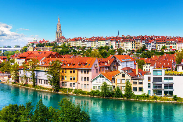 Scenic summer view of the Old Town architecture of Bern and Aare river embankment in Berne, Switzerland