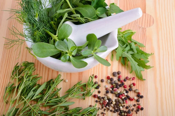 Mortar with herbs — Stock Photo, Image